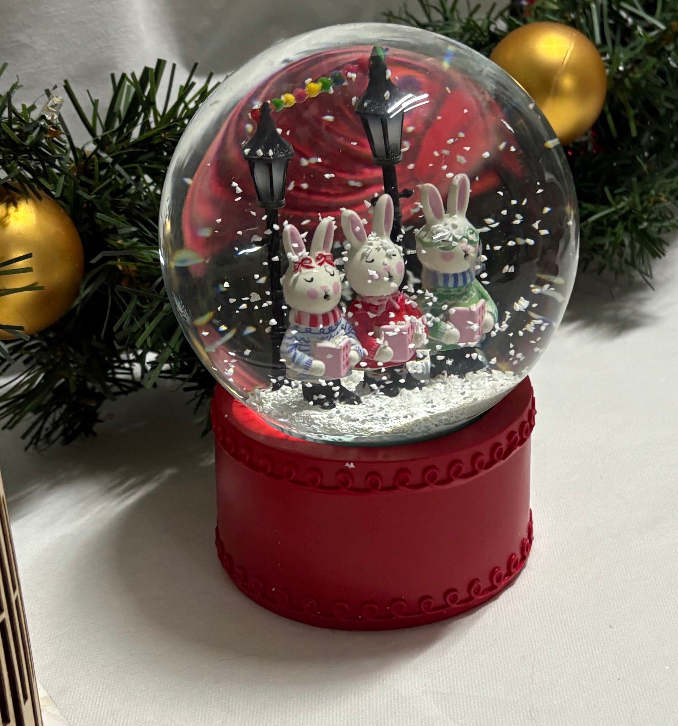 Beautiful Medium Sized Rabbits Snow Globe with Red Base