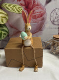 Brown Sitting Green Egg Twine Leg Bunny Resin Figure