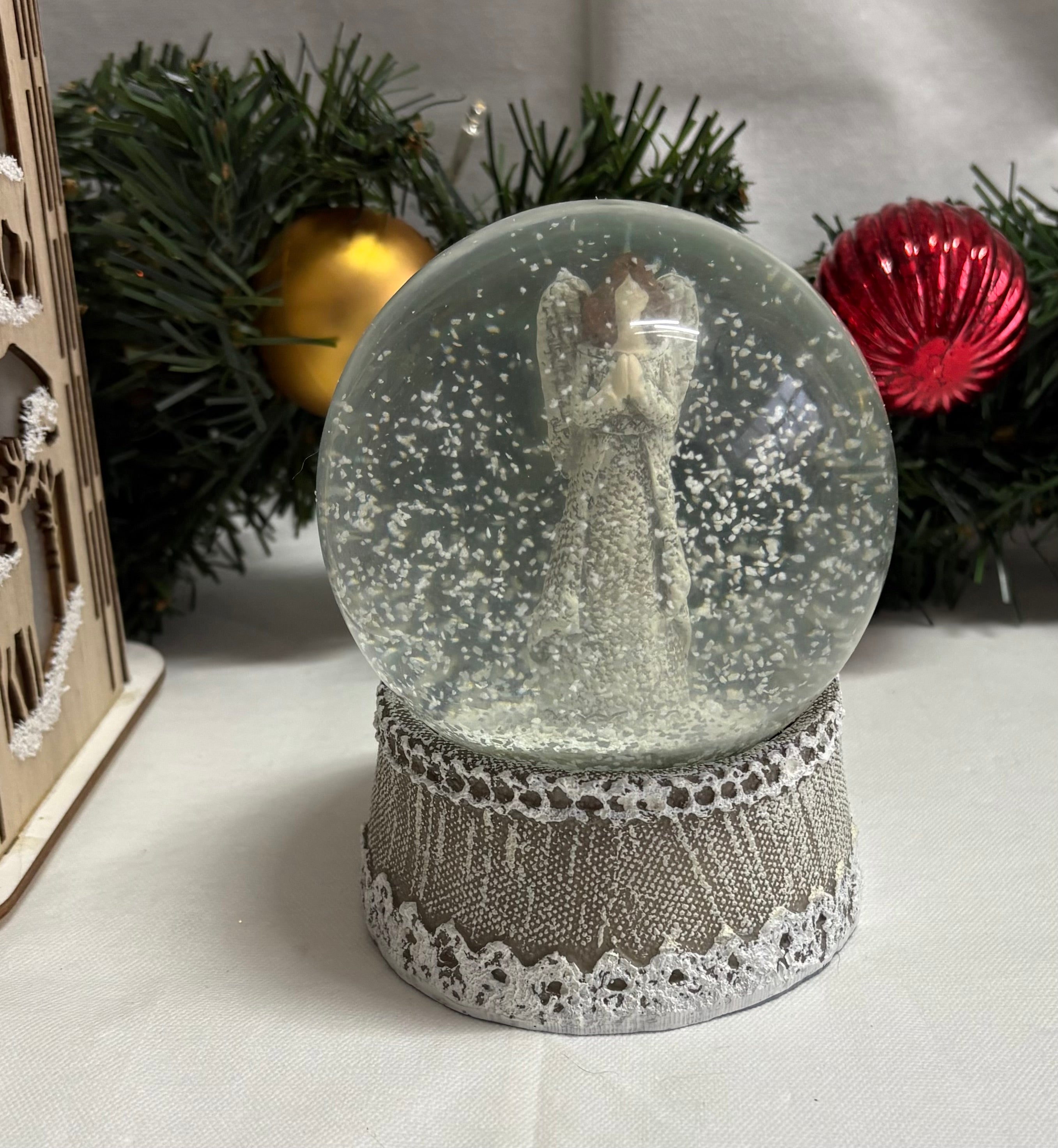 Beautiful Medium Sized Angel with Lace Base Snow Globe