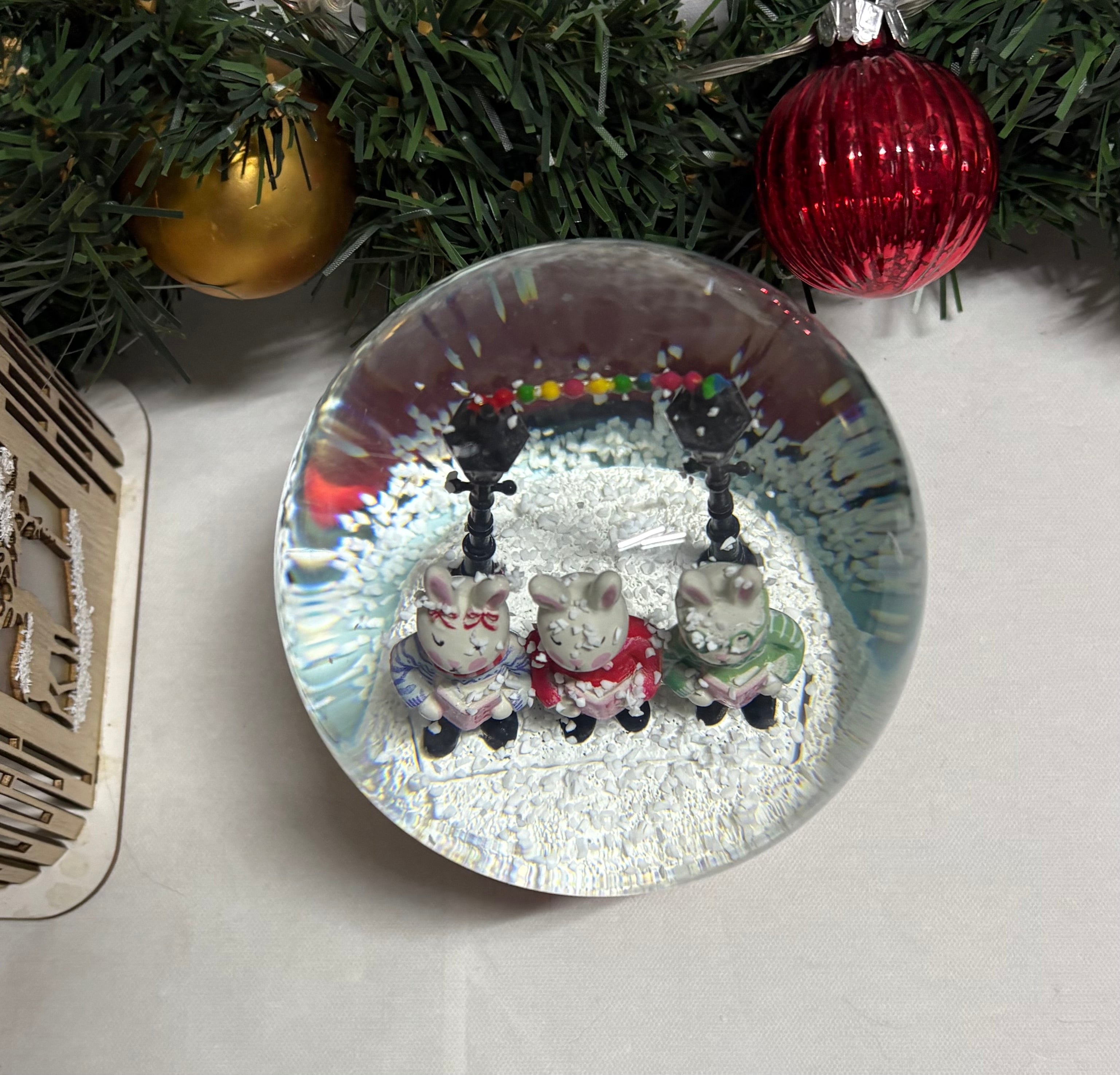 Beautiful Medium Sized Rabbits Snow Globe with Red Base