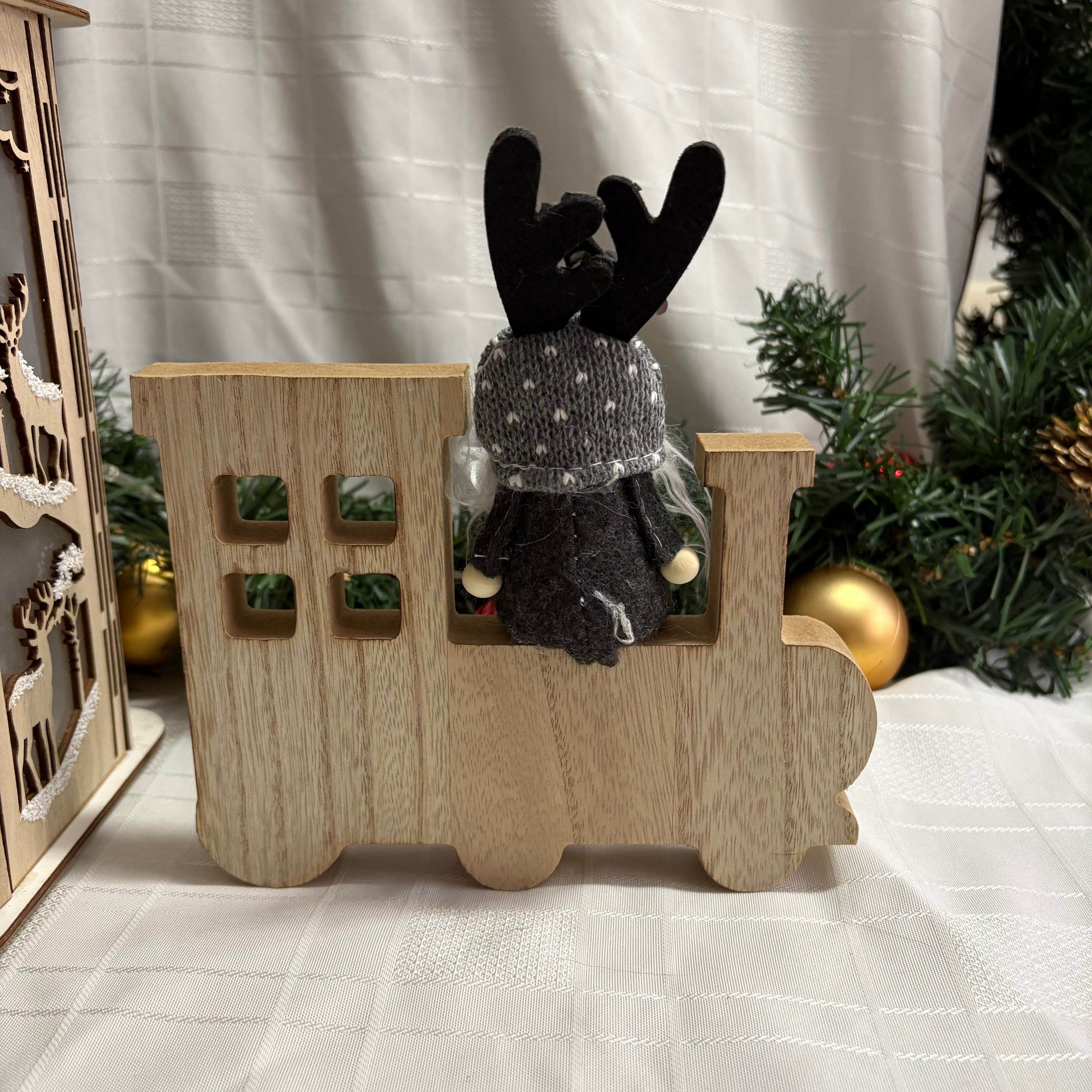 Grey Gonk Sitting On Wooden Train Christmas Ornament