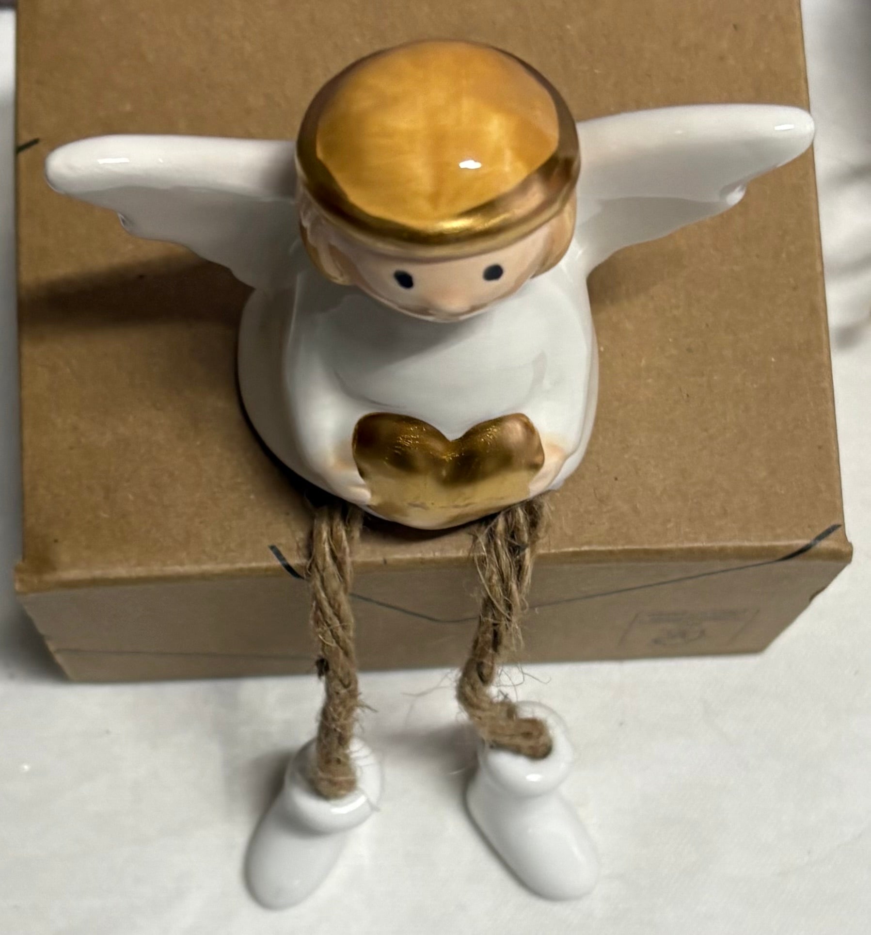 Porcelain Angel with Twine Legs Sitting Ornament