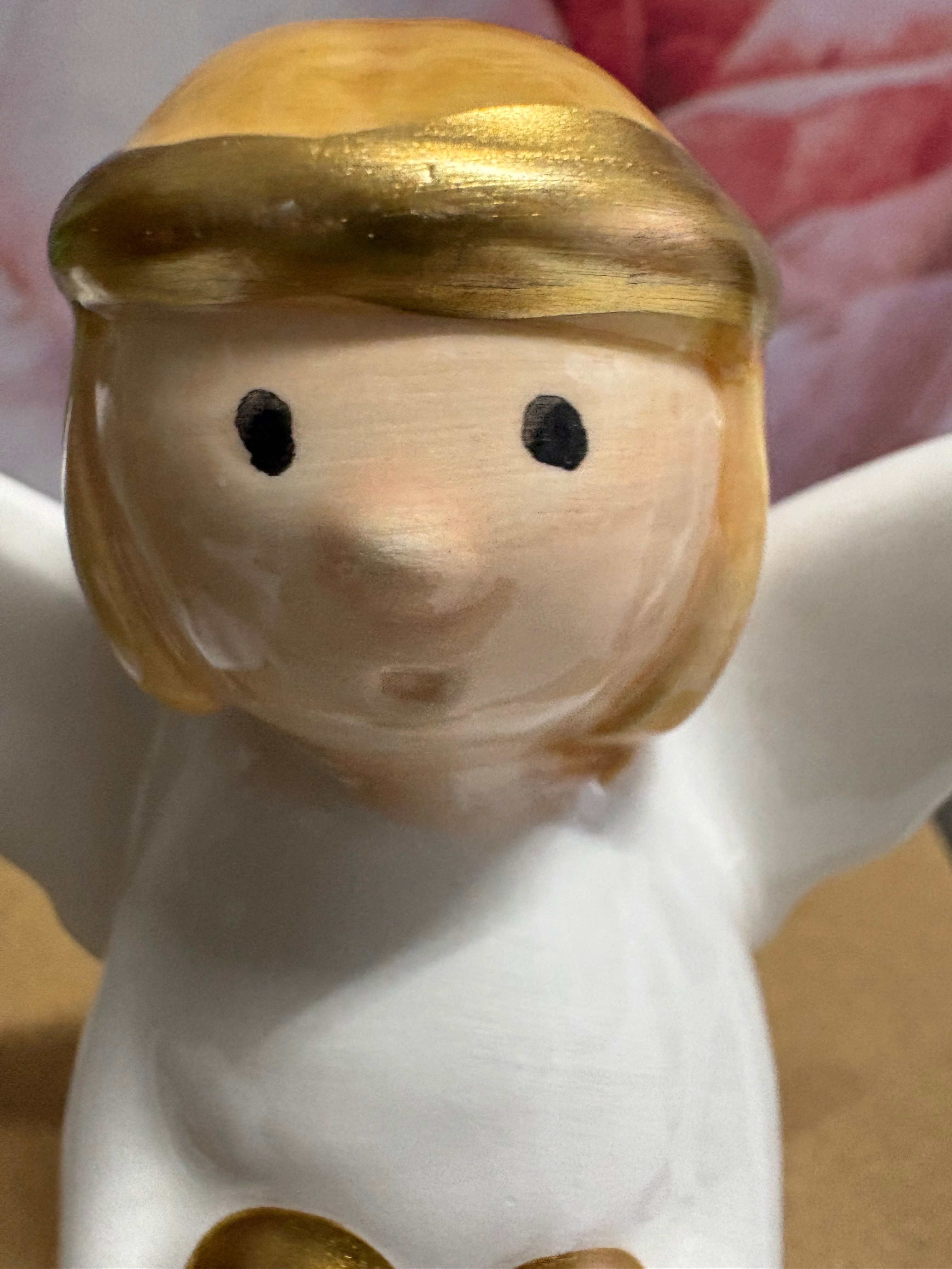 Porcelain Angel with Twine Legs Sitting Ornament