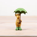 Standing Highland Cow with Green Umbrella Figure Ornament