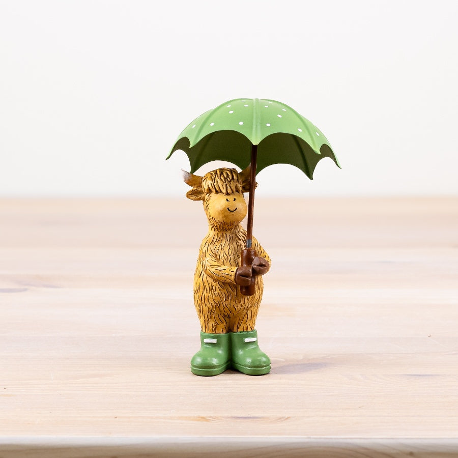 Standing Highland Cow with Green Umbrella Figure Ornament