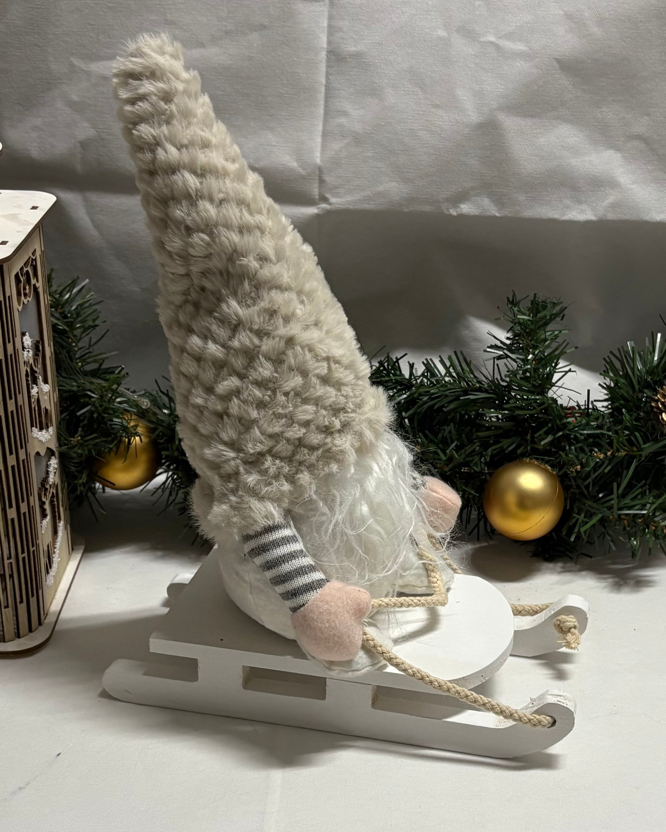Plush Gonk on a Wooden Sleigh Christmas Decoration