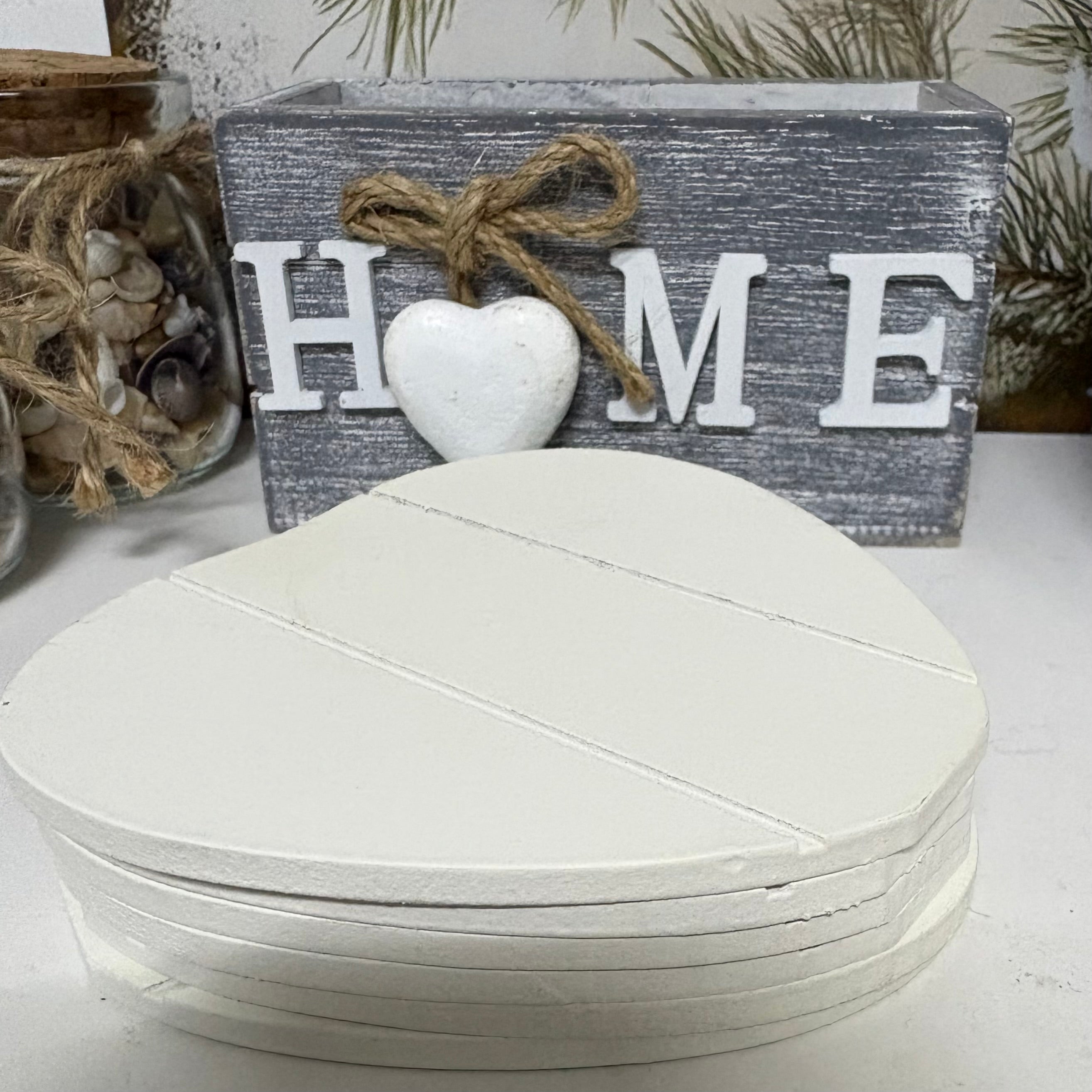 White Wooden Heart Coasters in Home Box