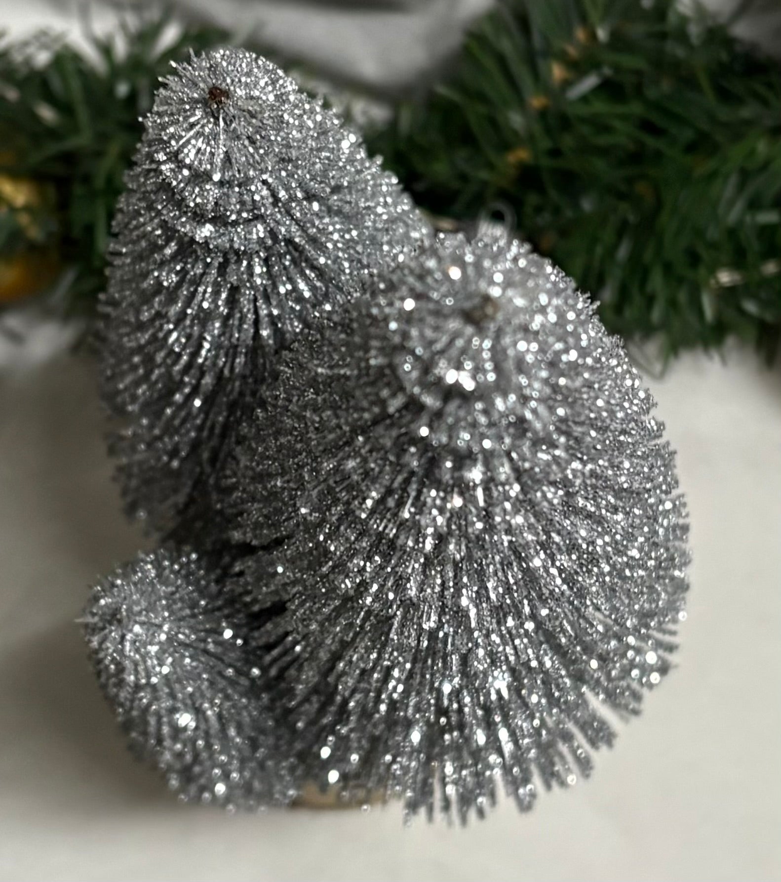 Silver Bottle Brush Tree Trio on Wooden Log Base