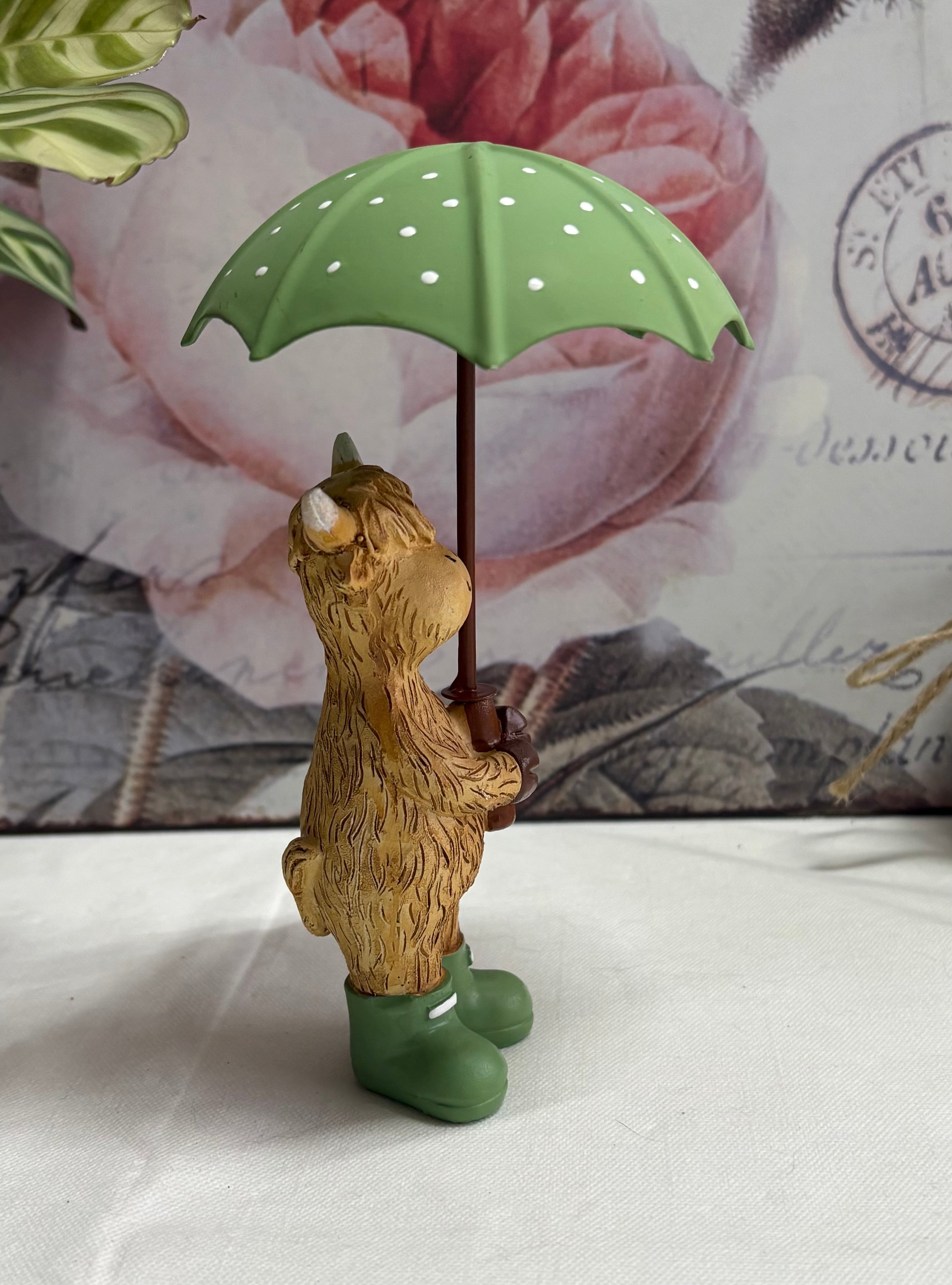 Standing Highland Cow with Green Umbrella Figure Ornament