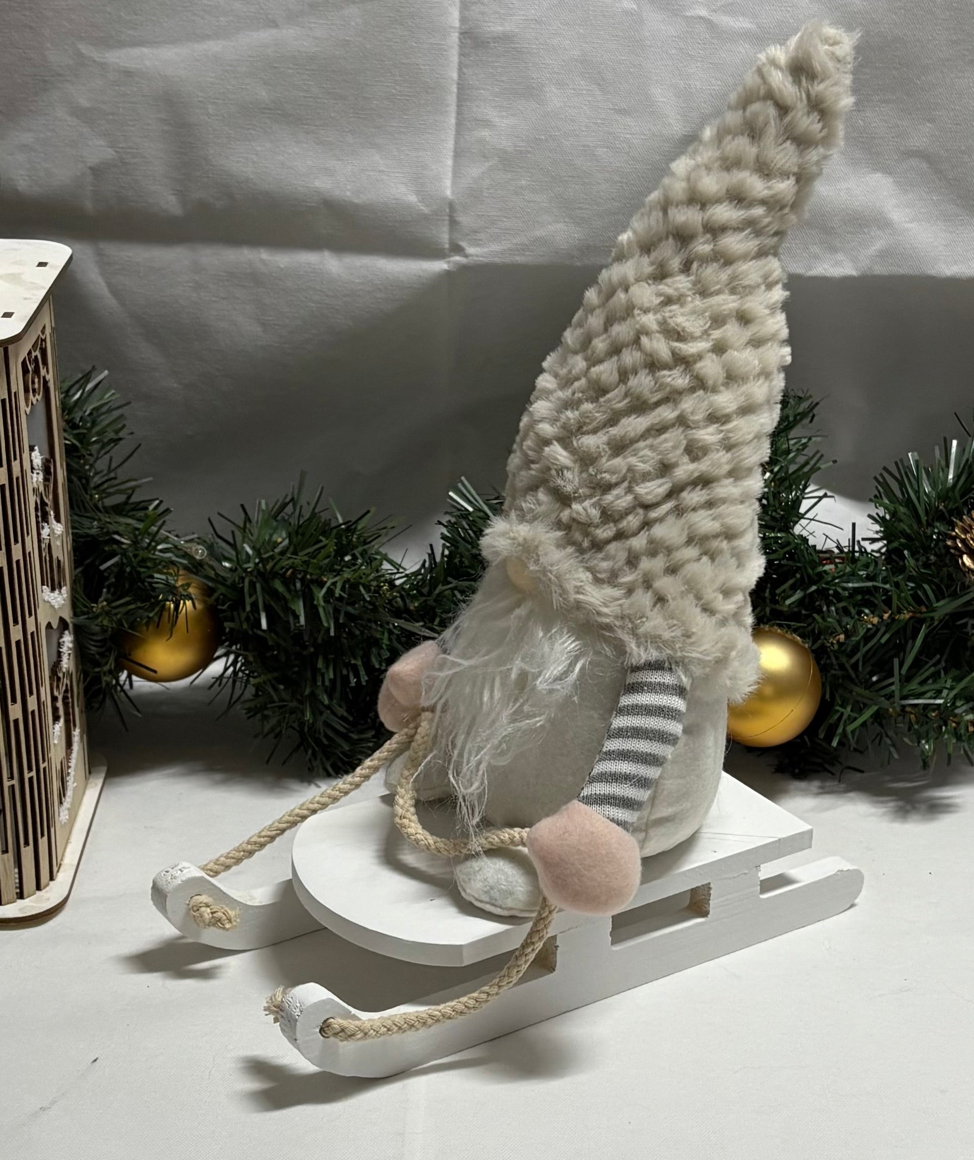 Plush Gonk on a Wooden Sleigh Christmas Decoration