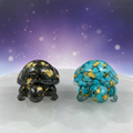 Crystal turtle figurines with simple mystical background
