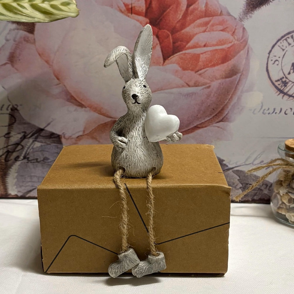 Grey Sitting White Heart Twine Leg Bunny Resin Figure