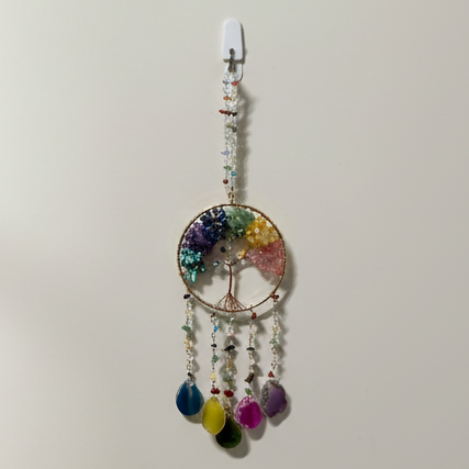 Rainbow Tree of Life dreamcatcher in styled meditation room - square format